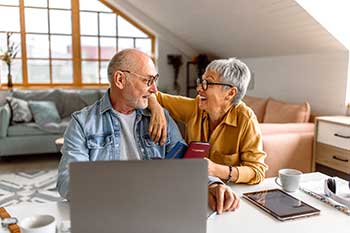 older couple on a laptop