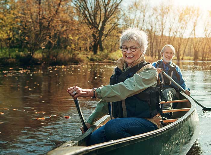 senior couple kayaking