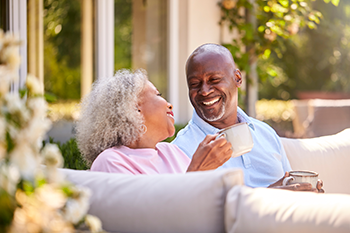 couple sitting and laughing